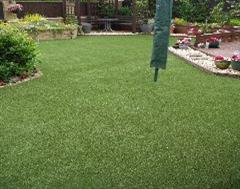 A fantastic Artificial Grass back garden and patio